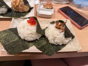 A - Salted salmon row (ikura), fried sardines and shansho peppercorns